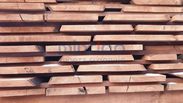 The processed hard beech wood planks were stacked together