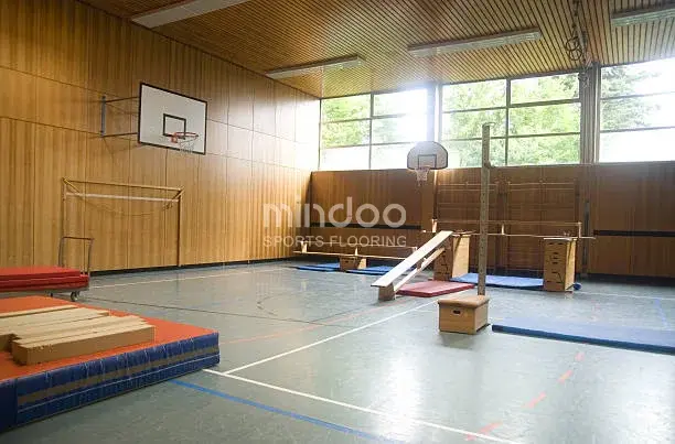 The basketball court was laid with wooden beech flooring